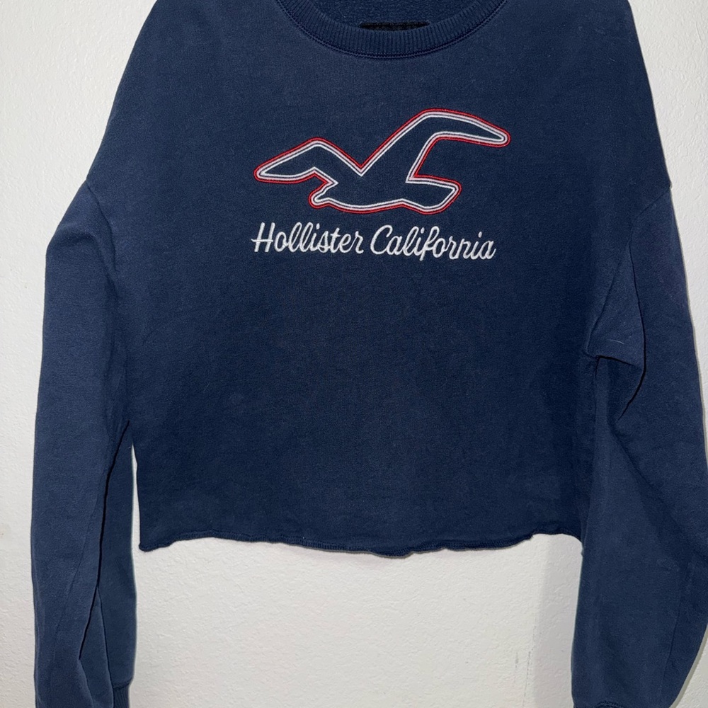 Medium Hollister navy blue embroidered  crewneck crop sweatshirt.